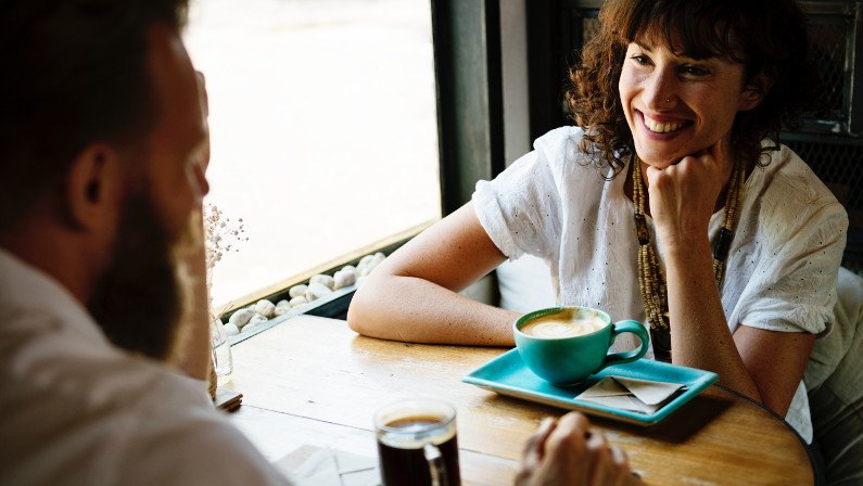 delegating 2 talking with colleague